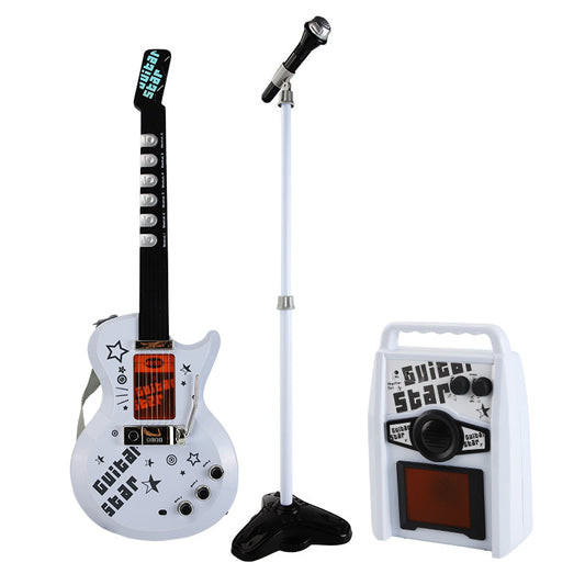 A complete set of a children's electric guitar in white with black accents, along with a microphone on a stand and a small amplifier, ready for kids to play and sing with.