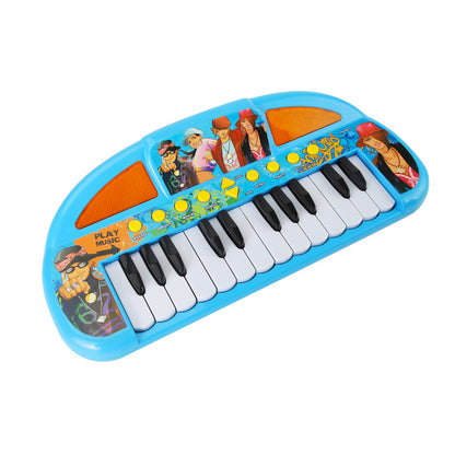 Top view of a blue electric keyboard piano toy with colorful buttons and character illustrations.